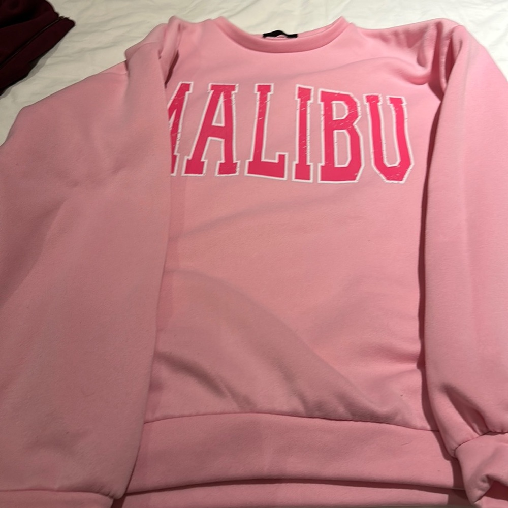 Malibu similar to Barbie pink sweatshirt. Super comfy.